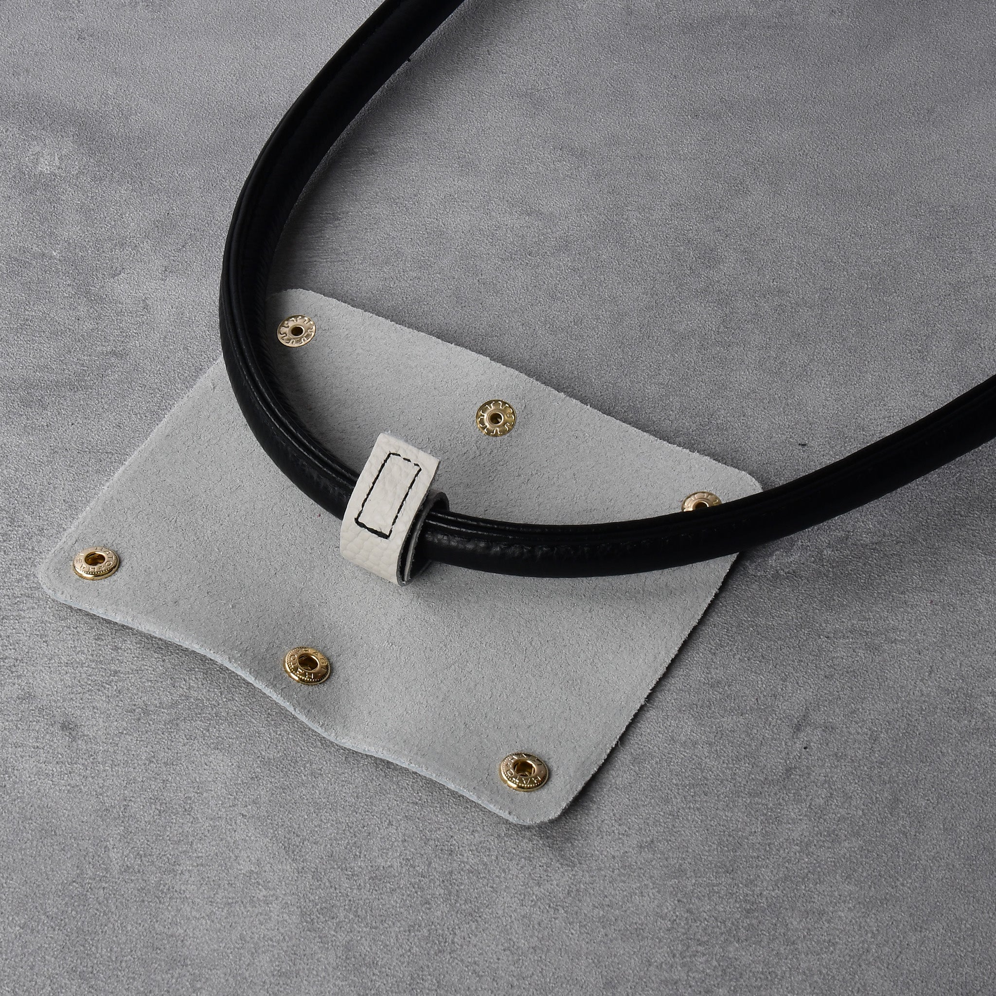 Italian leather bag handle cover with gold hardware and mounting function